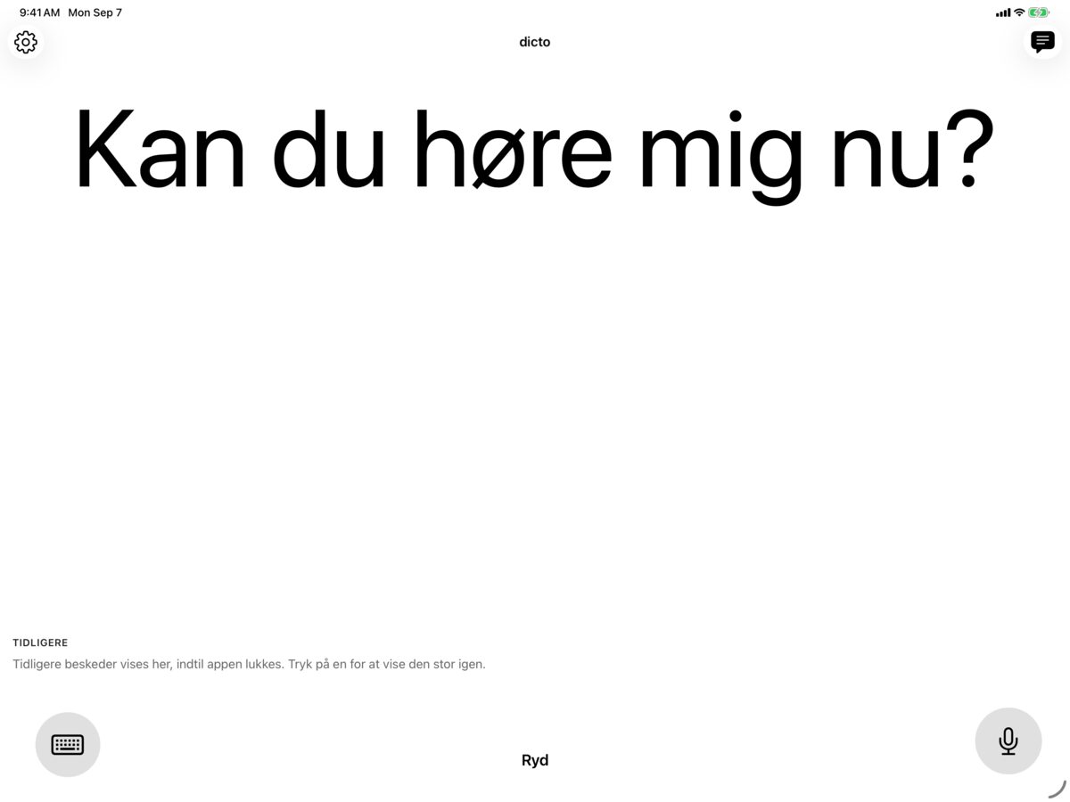 dicto på iPad i sort på hvid med beskeden Kan du høre mig nu?