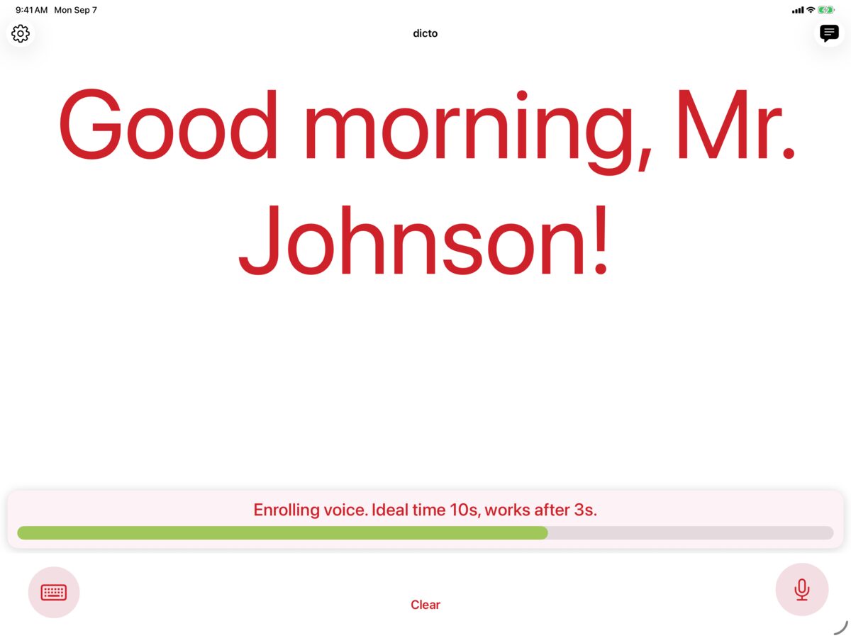 dicto on iPad enrolling a voice with Solo, showing the message Good morning, Mr. Johnson! in crimson on white